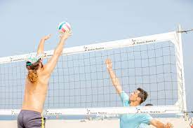 can you block over the net in volleyball