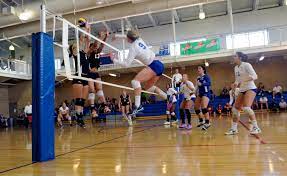 can you block over the net in volleyball